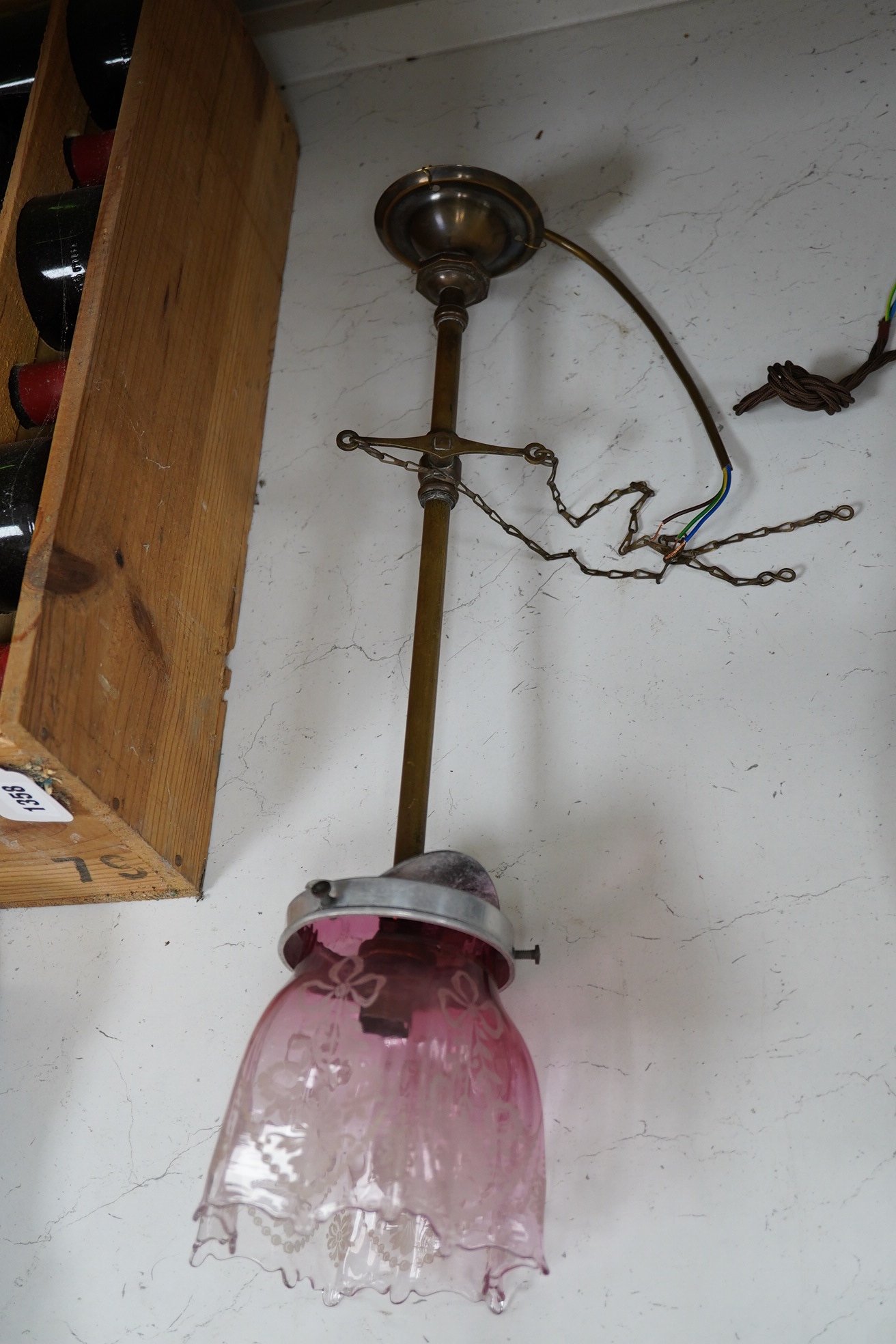 An original English gas pendant converted to electricity with acid etched pink glass shade, circa 1880’s-1890’s, wired, overall 54cm high. Condition - good